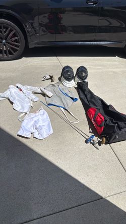 Fencing, gear right handed, two helmets, bag, glove, sword, and vest