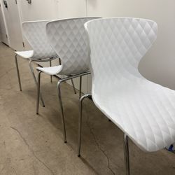 White Plastic Chairs (5) & (5) White Desks 