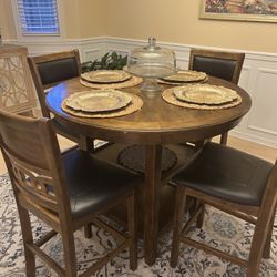 42” Round Table And Chairs 