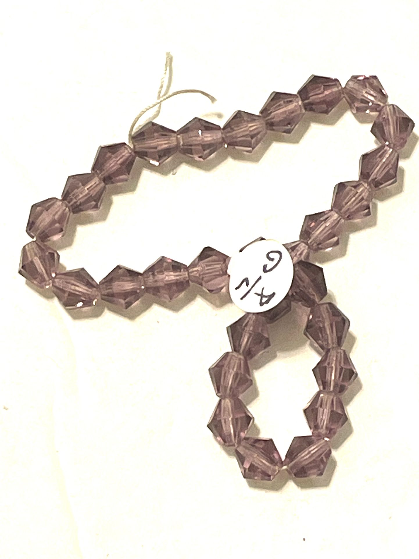 Strand Of 30 Purple Glass Beads