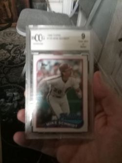 1989 Topps #100 Mike Schmidt graded 9 near mint