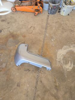 TOYOTA TACOMA OEM REAR BUMPER COVER  LEFT SIDE