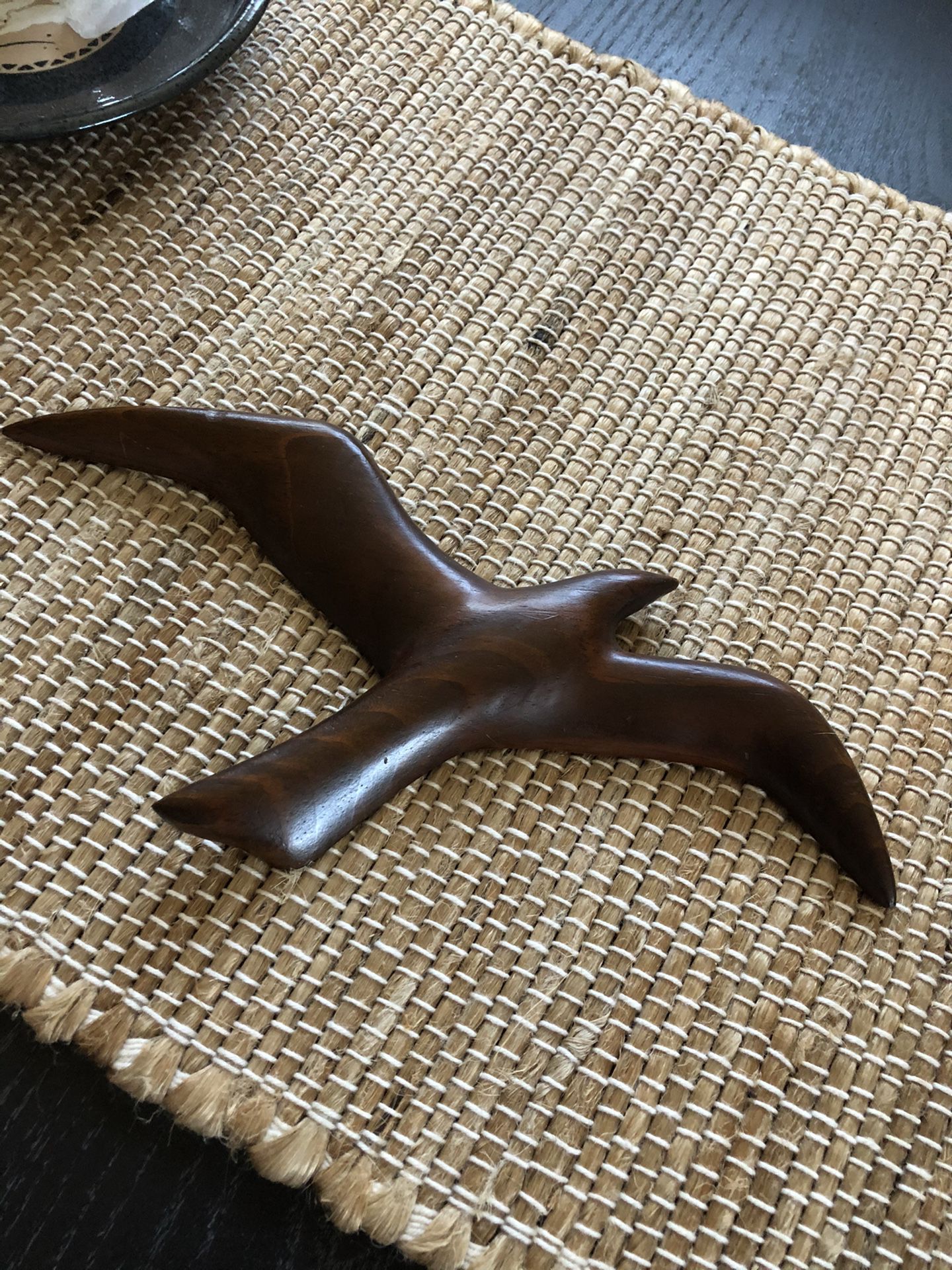 Carved, wooden bird.