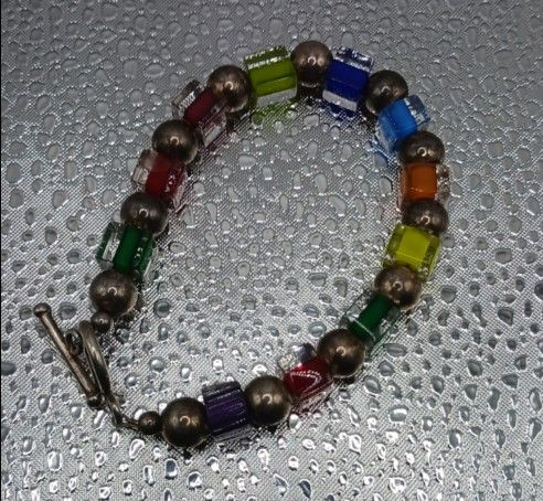 Vintage Multi colored square beads, sterling beads and clasp bracelet
