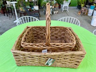 Two large rectangular woven storage baskets