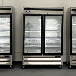 Atosa MCF8703ES 54 2/5" W x 31 7/10" D x 83 1/10" H Two-Section Hinged Glass Doors Freezer Merchandiser