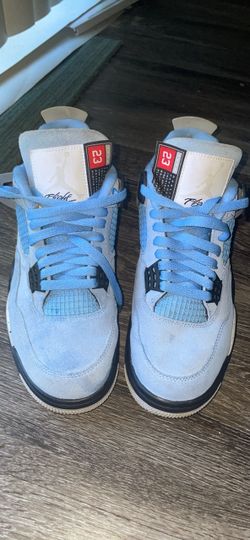 jordan 4 retro university blues size 8.5 in men’s size 9 woman’s