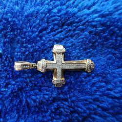 10k Gold Cross Pendant With 1/8th Ct. T.W. Diamond