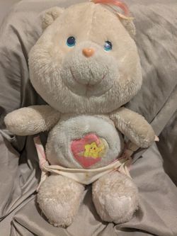vintage 1983 Kenner Baby Hugs Care Bear plush toy. 