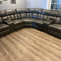 New Reclining Sectional.  Grey Or Ink Blue Gel Leatherette.  123” X 123”.  Free Delivery!