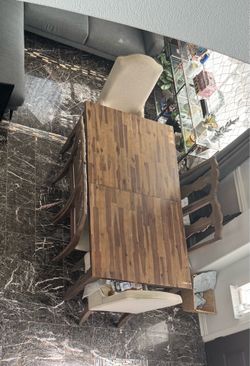 Wooden table with 6 chairs