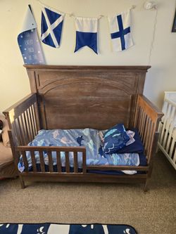 Brown wood crib w toddler bed/bed conversion