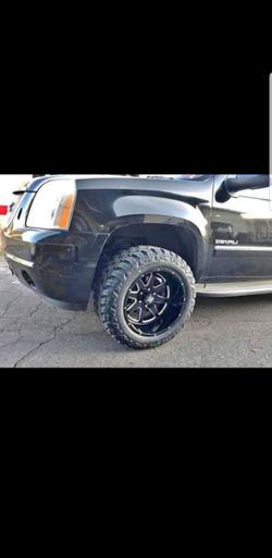 Rims tires and leveling kit installed