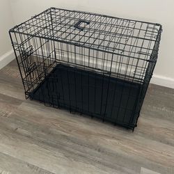 Dog crate with bed