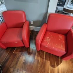 Pair of Red Accent Swivel Chairs