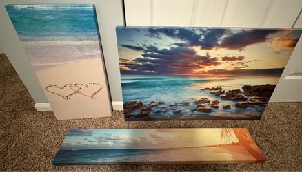 Three waterfront canvas paintings