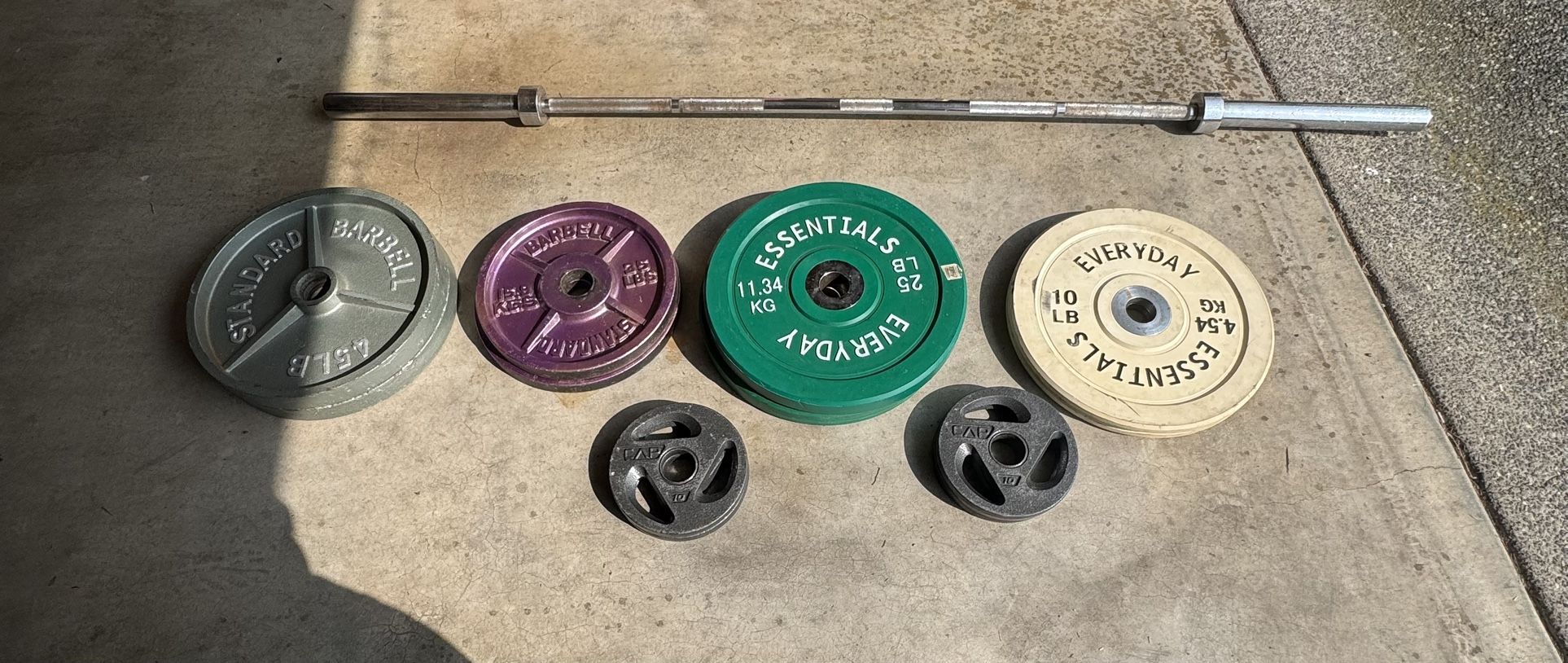 Olympic Bumper And Metal Plates 270 Lbs Set