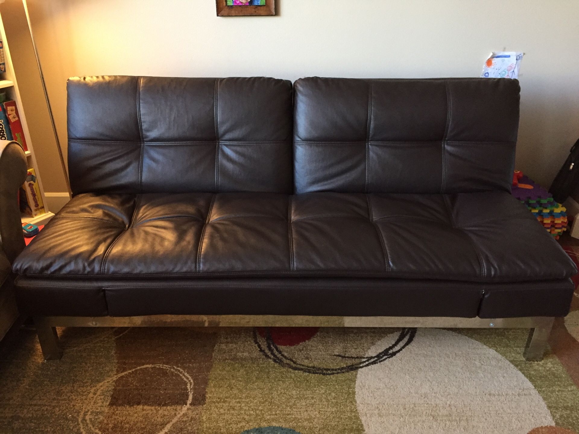 Leather Couch Can Turn into Full Size Bed / Futon