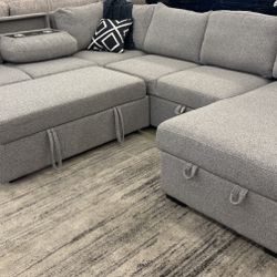 Sectional W/ Pull Out Bed And Storage Chaise