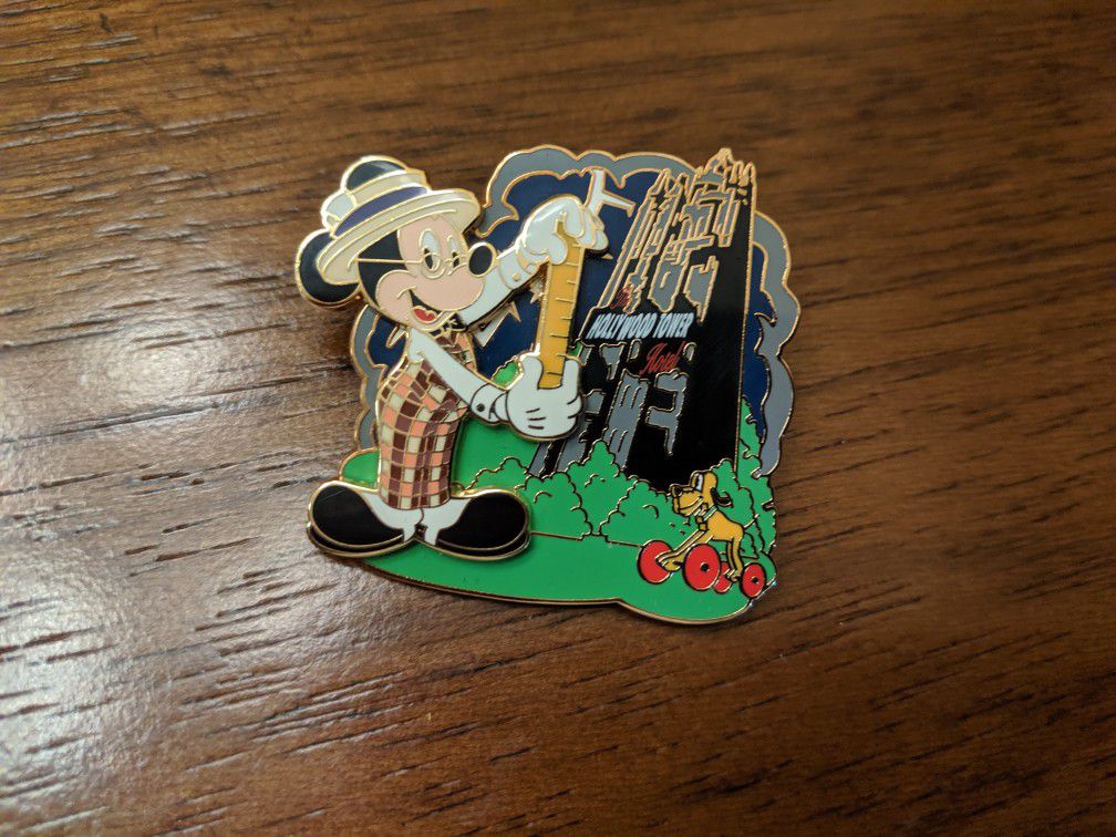 Disney limited edition pin of 2000 the main Street gazette collection featuring Mickey Mouse Pluto and Hollywood tower of terror