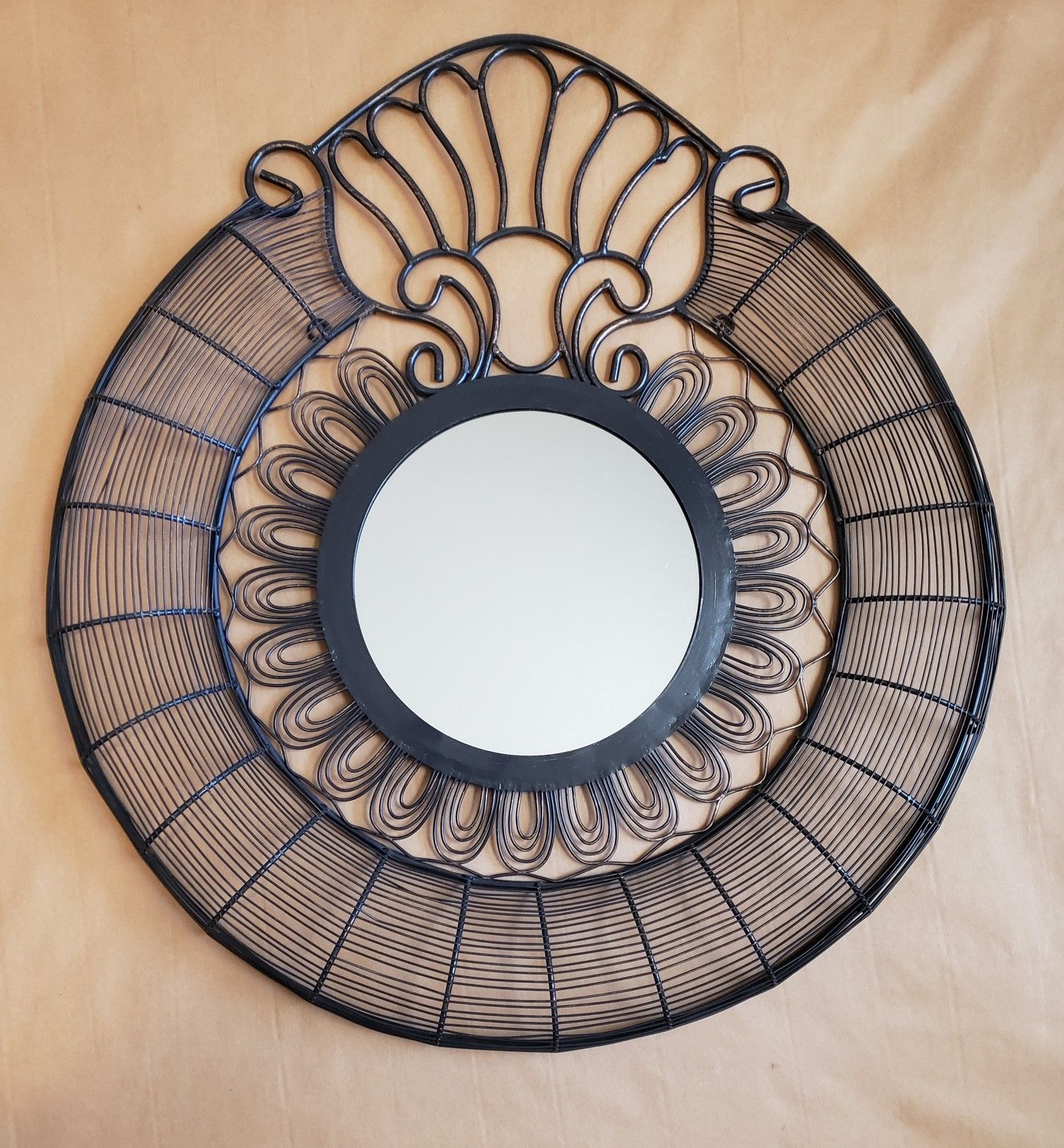 Circular wire wall art with mirror