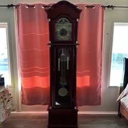 Daniel Dakota’s Cherry Red Grandfather Clock Astoria Grand