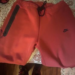 Red NIKE tech Pants