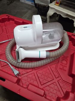 Vacuum dog brush