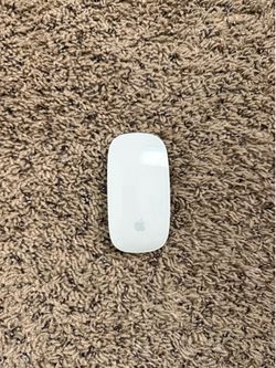 Apple Magic Mouse (Bluetooth) – Uses 2 AA Batteries