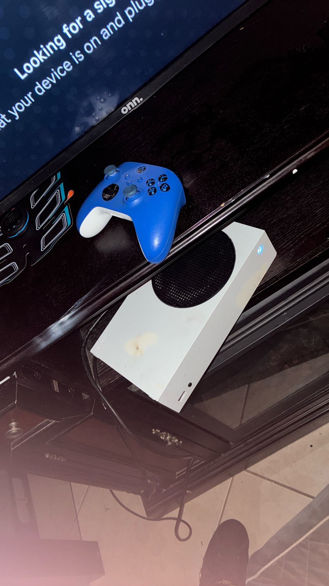 I got this as a gift from my uncle a couple Months Ago, It Works Perfectly Fine And Has A Lot Of Games and comes with a controller brand new