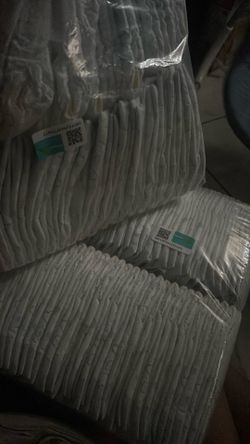 Newborn diapers/ pampers swaddlers
