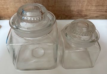 Avoid plastics! These beautiful vintage matching sanded glass stopper storage jars are rare and in great condition!