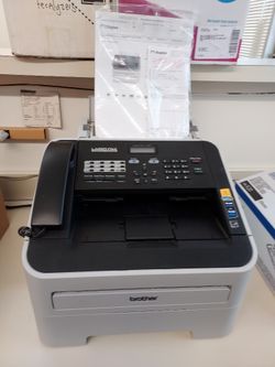 Laser FAX Machine w/brand new ( never opened) Replacement Drum Unit