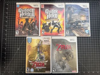 Nintendo Wii Games Lot plus guitar