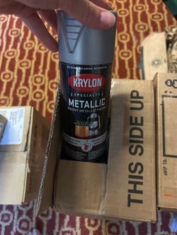 Box of Krylon Aerosol spray cans metallic