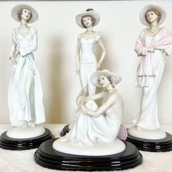Four Annie Rowe Statuette Figurines 12" and 6.5".