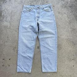 Vintage 90’s Distressed Levi’s 550 Orange Tab Light Washed Jeans