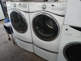 Whirlpool Duet front load washer and dryer set on pedestals - Free delivery