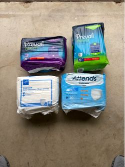 Packages of medium adult diapers for sale
