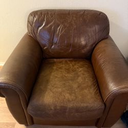 Genuine brown leather armchair & ottoman 