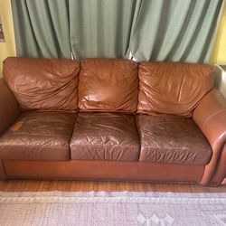 Leather couch with pullout bed