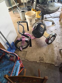 This is a pink Schwinn Roadster 12-inch retro-style