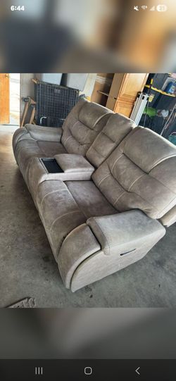 Reclining Couch with electric recline and USB ports.