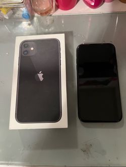 iPhone 11 with charger and box