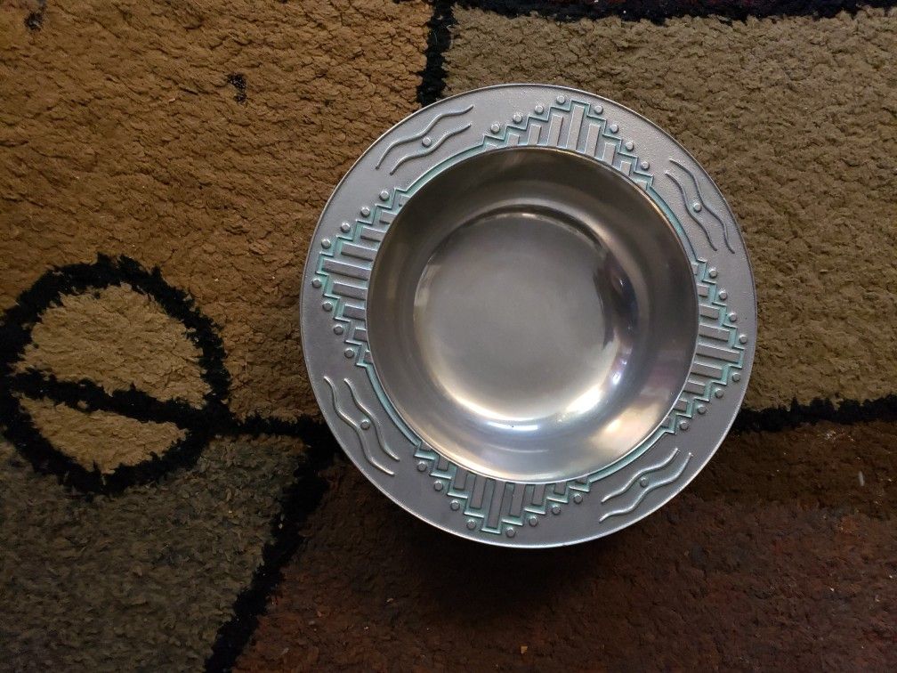 This is a classy Wilton Armetale pewter bowl in the Zia pattern from their antiquity collection. It has beautiful turquoise raised Southwestern styled
