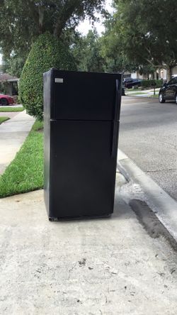 Free Fridge Freezer working but only good enough for parts .