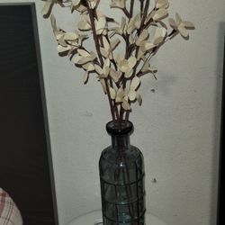 Grey Glass Bottle With White Artificial Eucalyptus Stems 