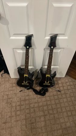 Two Guitar Hero Guitars