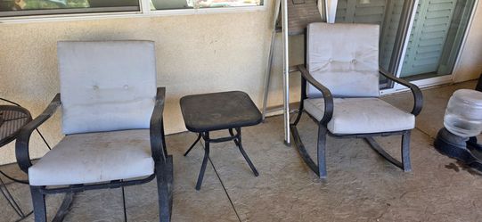 Two rocking chairs with table