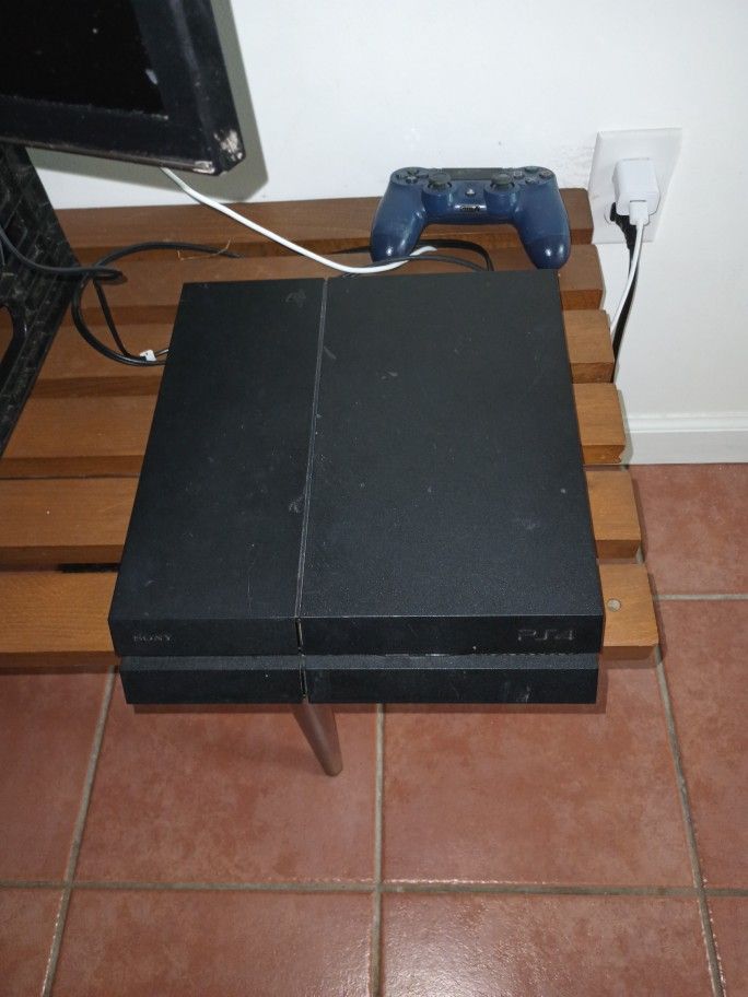 PS4 w/ Cords and Controller